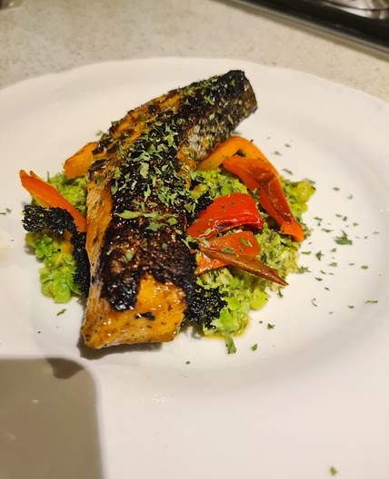Firecracker Salmon with pea mash and roasted capsicum