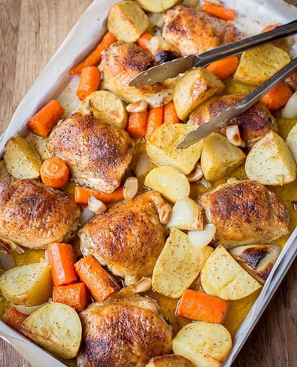 Roasted potatoes, carrots and chicken