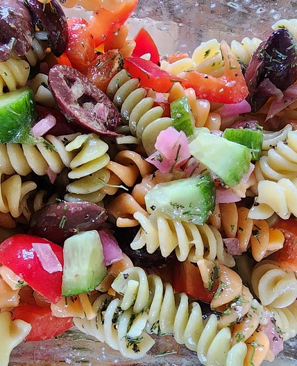 Greek pasta salad with spinach and feta