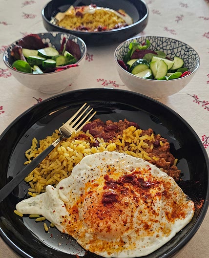 Mince beef beans and rice and fried egg