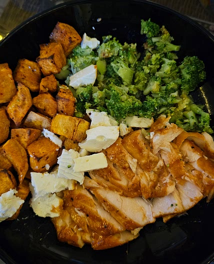 Asian salmon sweet potatoes broccoli and white cheese bowl