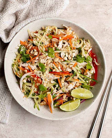 VIETNAMESE CHICKEN SALAD WITH SWEET LIME-GARLIC DRESSING (GOI GÀ)
By JULIA RACKOW