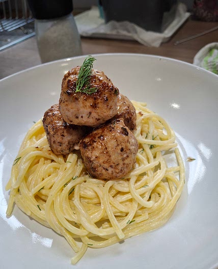 Swedish style pork meatballs with sour cream and dill spaghetti