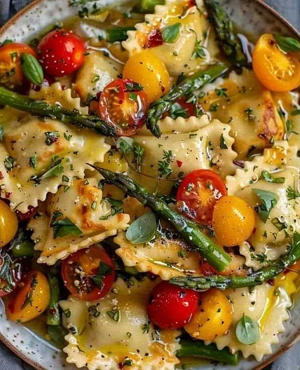 Ravioli with Tomatoes, Asparagus, Garlic, and Herbs