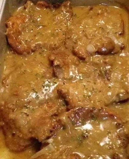 Pork chops with onion and mushroom gravy