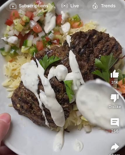 Kebab beef patties and yellow rice 