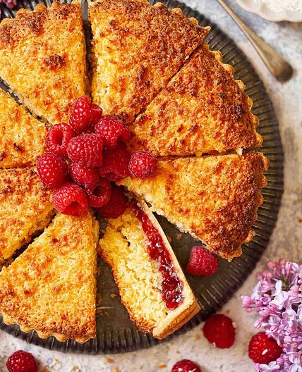 Coconut tart with raspberry jam
