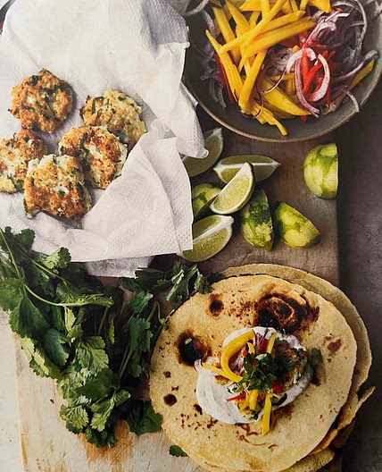 Fishcake tacos with mango, lime and cumin yoghurt