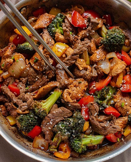 Stir-fry with general tso's chicken and steak strips