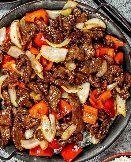 Sizzling Chinese Pepper Steak with Onions