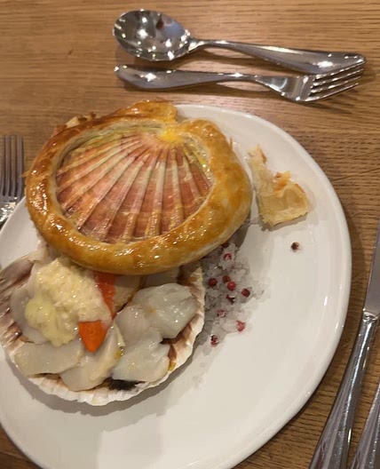 Scallop baked in shell with truffle