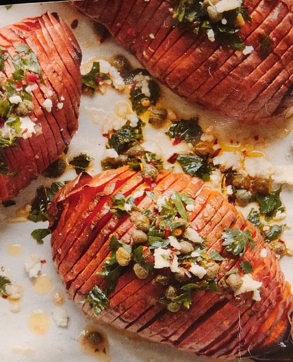 Hasselback sweet potatoes with caper salsa & feta