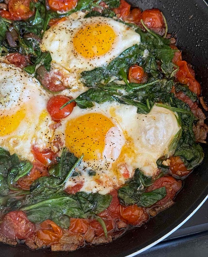 Shakshuka With Tomatoes And Spinach 