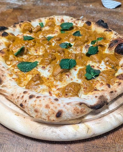 Butter chicken pizza
