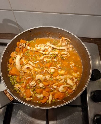 Seppie e piselli in umido