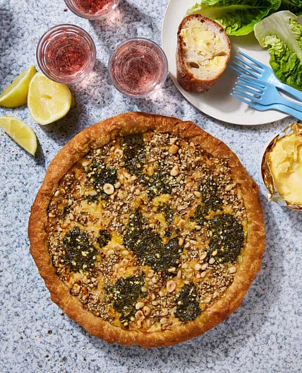 Smoked trout quiche with basil pesto and dukkah