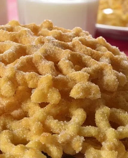 Buñuelos de viento espolvoreados