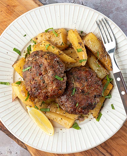 Oven-baked Greek burgers and potatoes