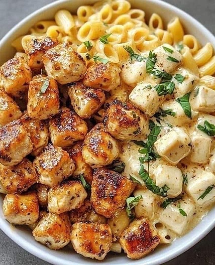 Garlic butter chicken bites with creamy Parmesan pasta 