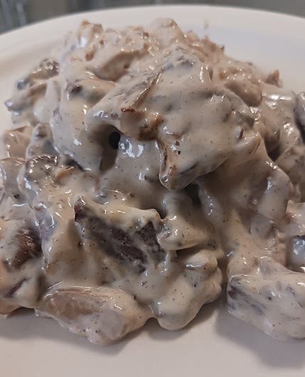 Ternera con setas y queso azul