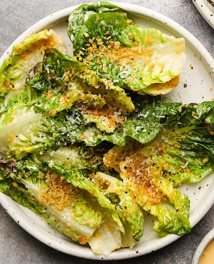 Little Gems Caesar with Challah Bread Crumbs and Black Sesame