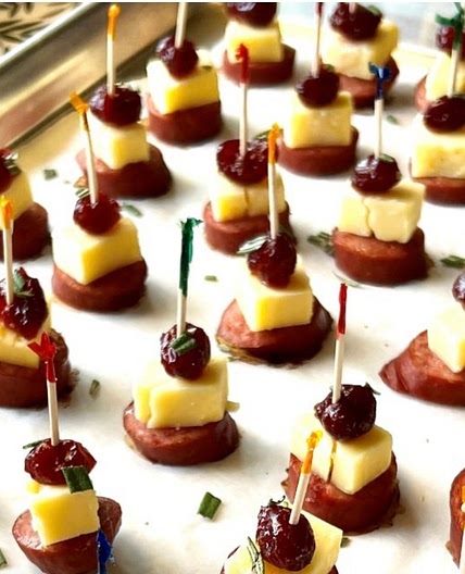https://themenumaid.com/smoked-sausage-cranberry-cheddar-bites/