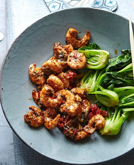 Firecracker prawns with stir-fried greens