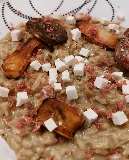 Risotto - Artichokes cream, prosciutto crudo, king oister mushrooms, and ricotta