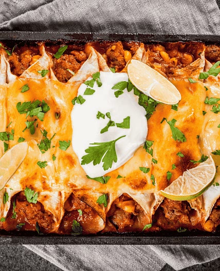 Mexican Rolled Tortillas in Sauce