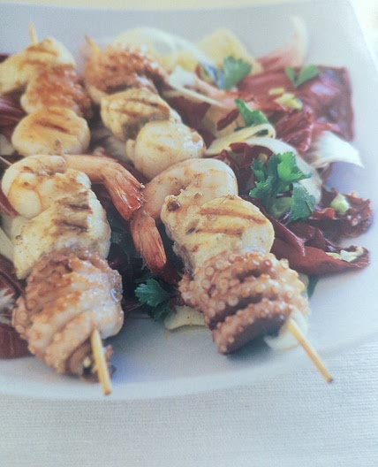 Seafood skewers with radicchio and fennel salad