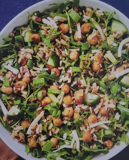 Lemony chickpea and arugula grain salad with cucumber cheddar and sunflower seeds