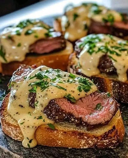 Beef Tenderloin Crostini with Parmesan Cream Sauce