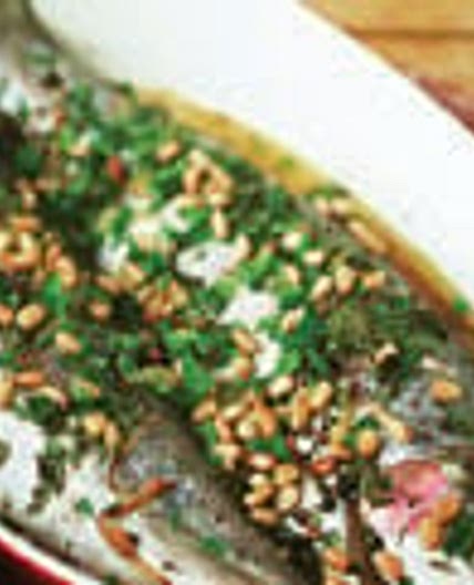 Lemon baked rainbow trout with pine nuts