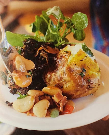 Beef hash with jacket potato and salad