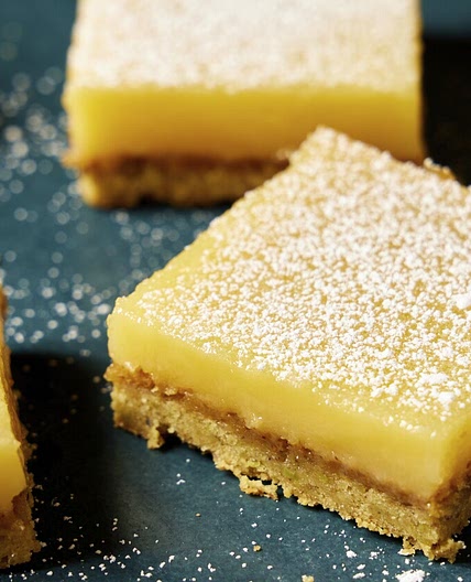 Savory olive oil and buttery pistachios bring sophisticated flavors to tangy-sweet lemon bars