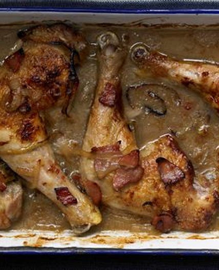 Chicken braised with cider and bacon