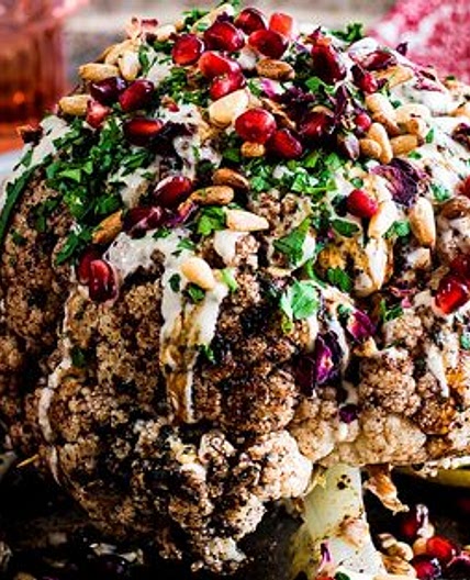 Cauliflower shawarma, pomegranate, tahini and pine nuts