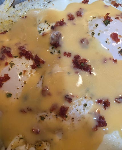 Sunny Steamed Eggs With Hollandaise And Jerkey Pieces