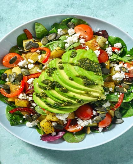 Mediterranean Style Avocado & Roasted Pepper Salad with Greek Style Cheese, Herby Potatoes and Pesto Drizzle