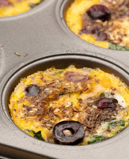 Za'atar Spiced Baked Eggs With Black Olives and Labneh