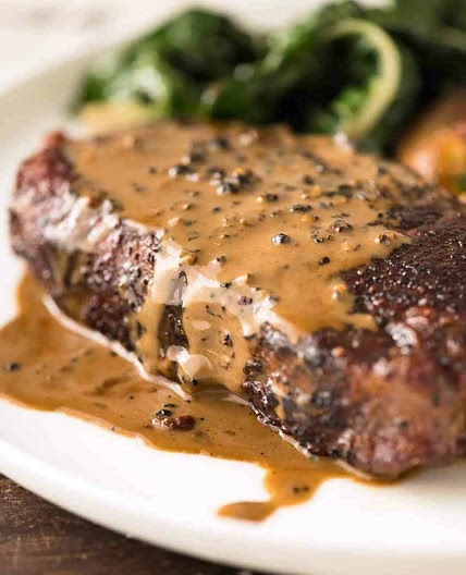 Steak with Creamy Peppercorn Sauce