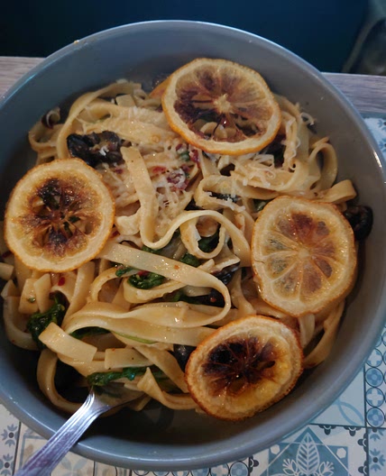 Tagliatelle with olives, rocket and caramelised lemons