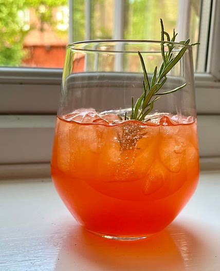 Grapefruit and rosemary aperol spritz