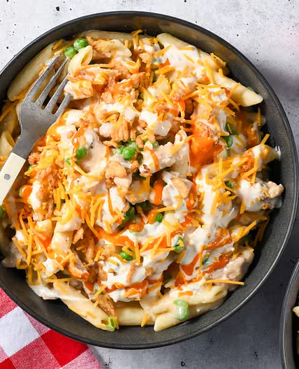 Zippy Buffalo Chicken Thigh Penne with crispy onions