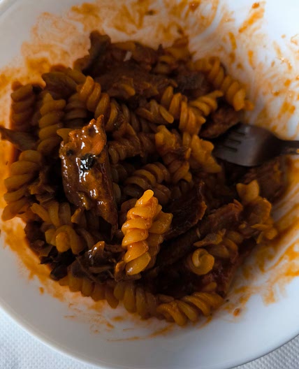 Pasta with herring in tomato sauce