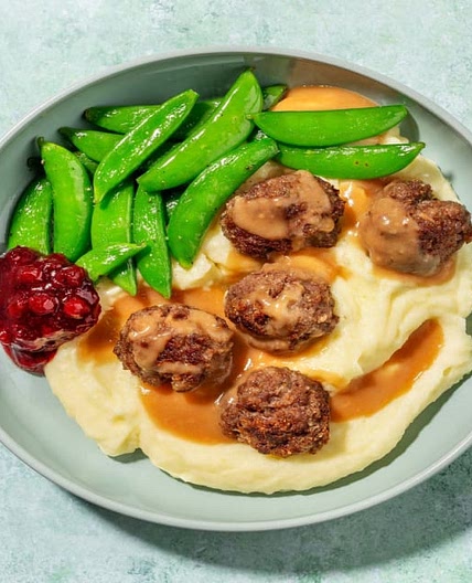 Swedish-Style Beef Meatballs with Creamy Gravy and Buttery Snap Peas