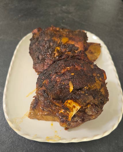 Slow cooked lamb shoulder with mint and cumin