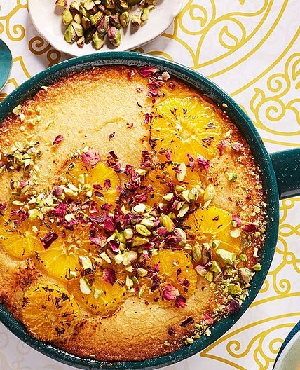 Sticky orange and semolina pudding with rose custard