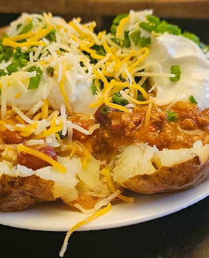 Chili loaded baked potatoes