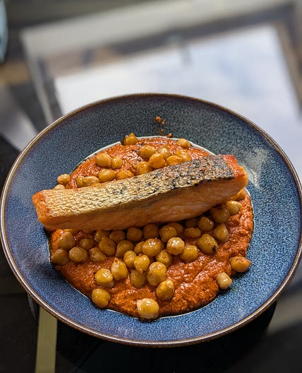 Crispy salmon, garlic and paprika chickpeas, roast pepper sauce
